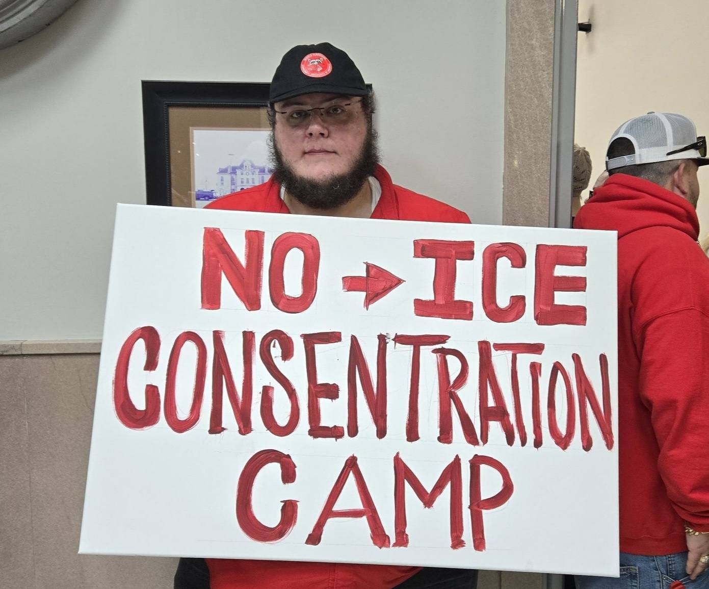May be an image of text that says 'NO→ICE NO ICE GONSENTRATION CAMP'