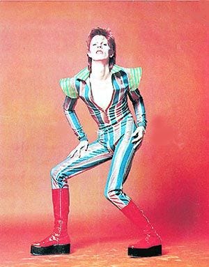 Diana’s “revenge dress” (1994), Bowie’s Ziggy Stardust (1973), Björk’s swan dress (2001)