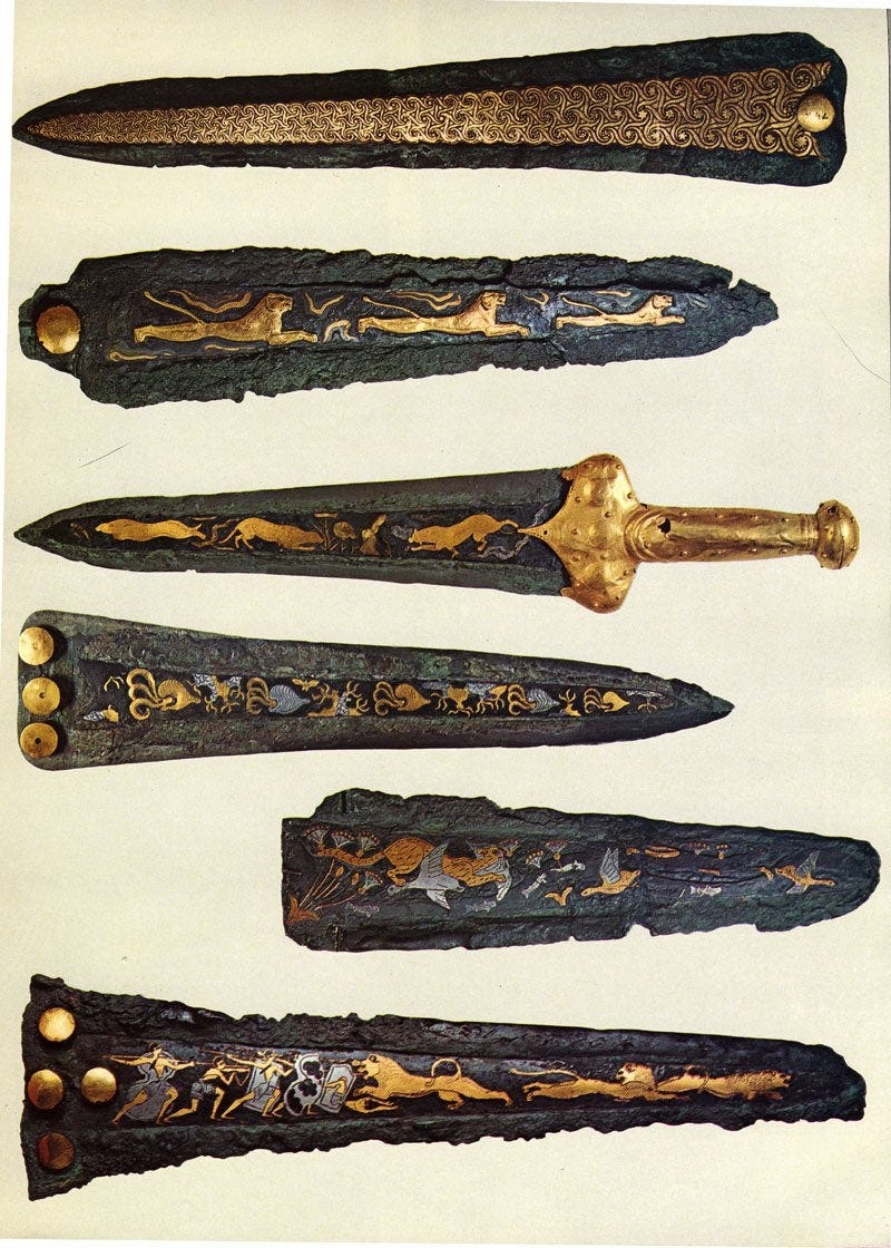 Six bronze daggers decorated with geometric patterns, animal and floral motifs and a lion hunting scene Six bronze daggers decorated with geometric patterns, animal and floral motifs and a lion hunting scene