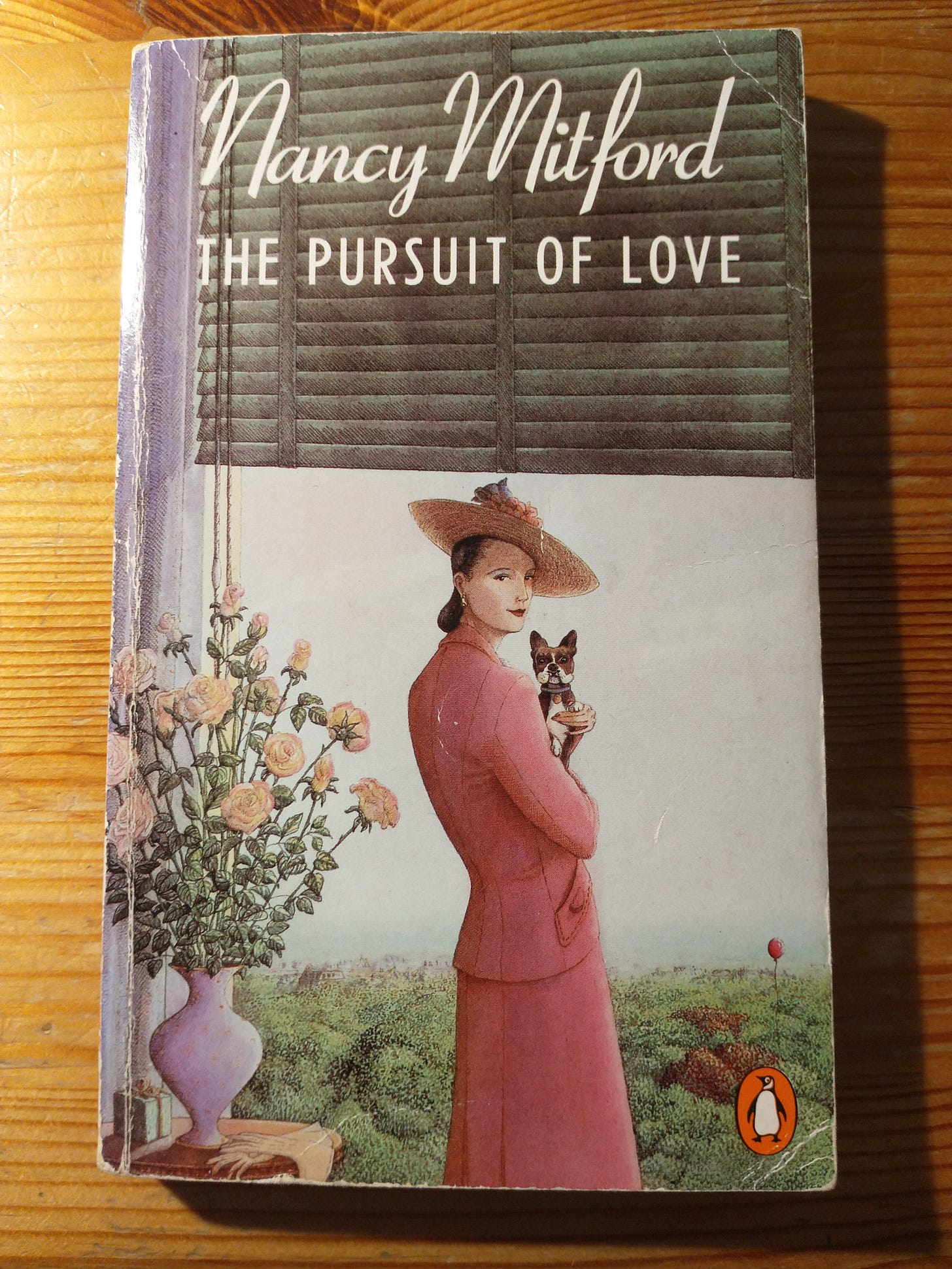 Paperback copy of The Pursuit of Love