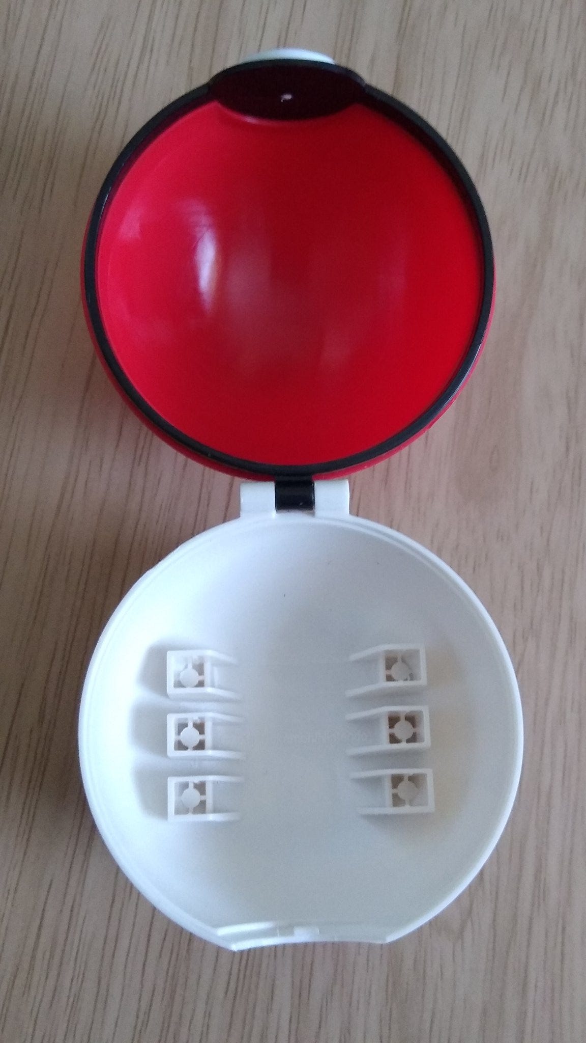 This Pokéball 3DS Cartridge Holder was a pre-order bonus for Pokémon X & Y, given away to customers at GAME stores in the UK This Pokéball 3DS Cartridge Holder was a pre-order bonus for Pokémon X & Y, given away to customers at GAME stores in the UK