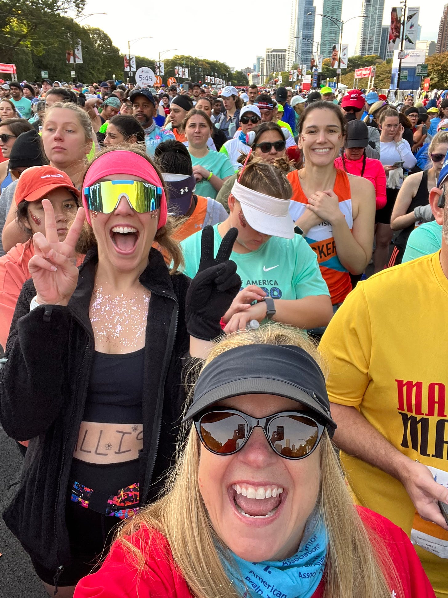 A sea of runners stand waiting at the starting line of the 2023 Chicago Marathon