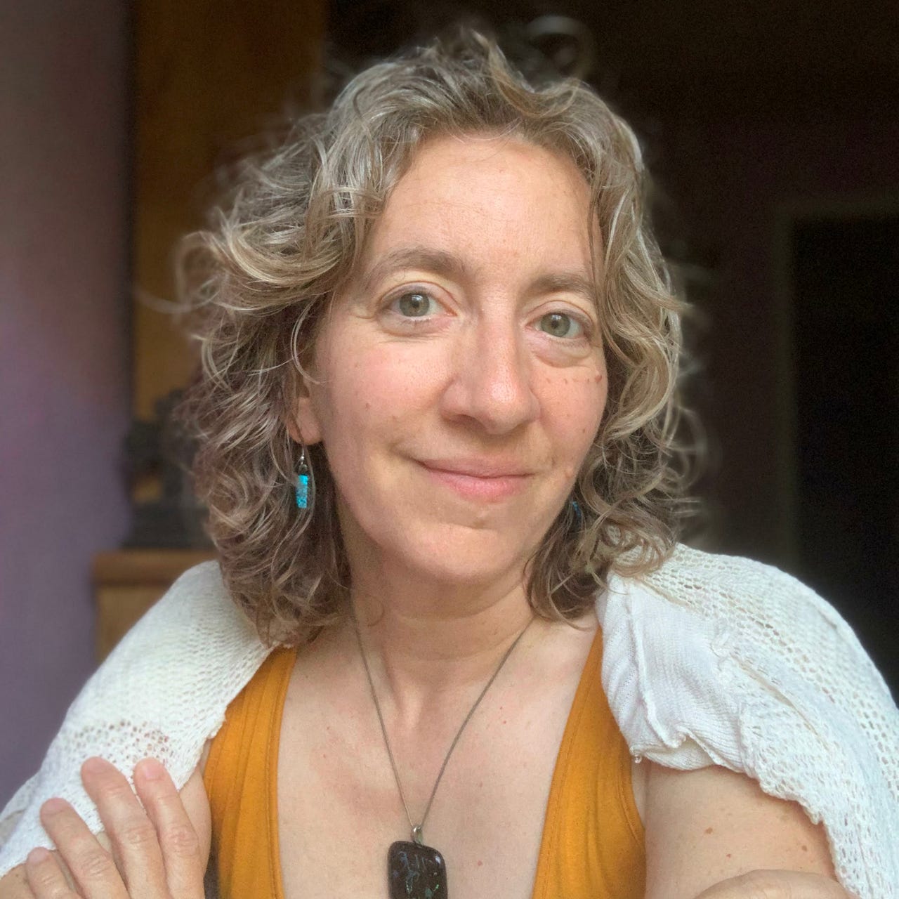 Kathleen Basi, storyteller, songwriter, speaker logo