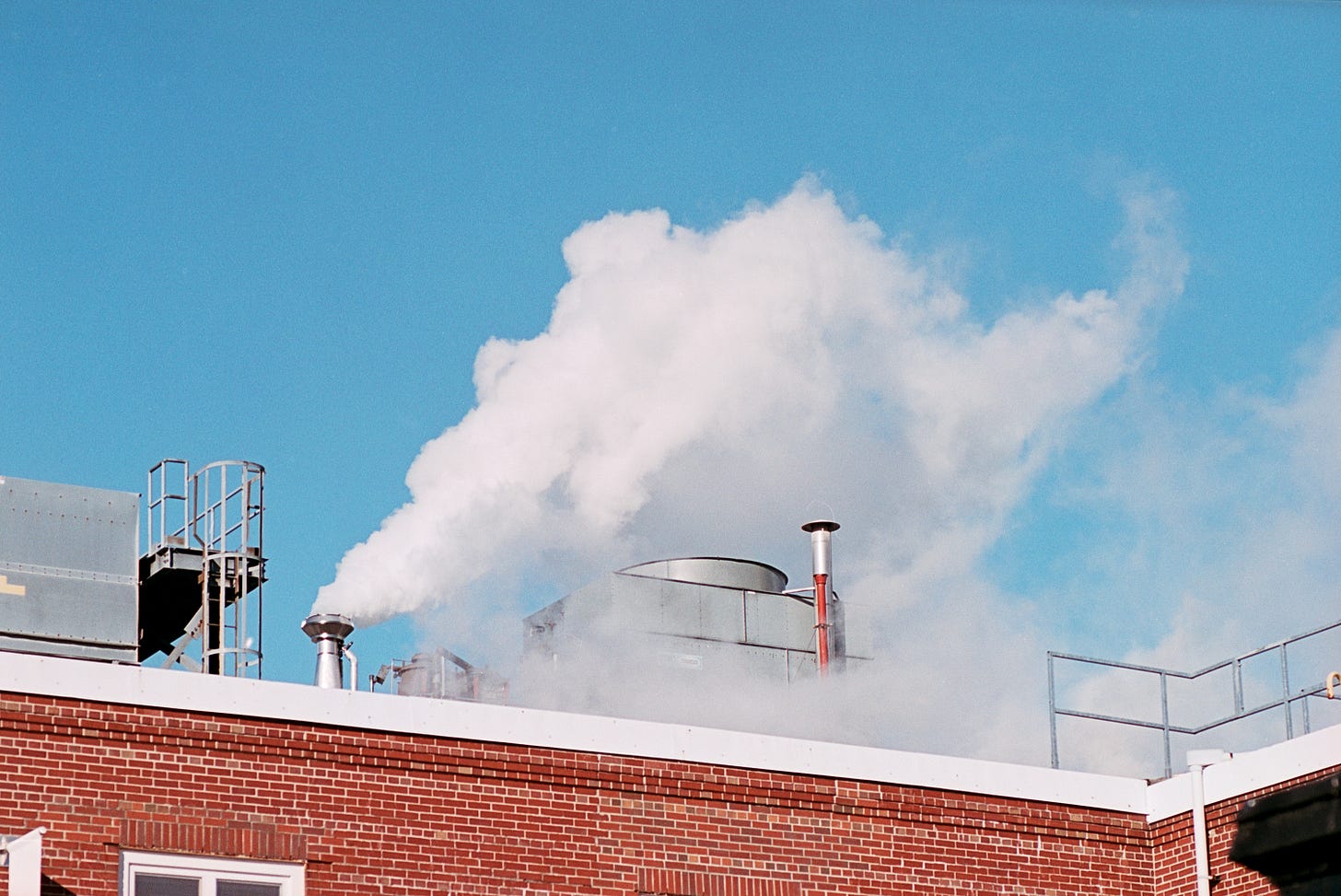 White smoke out of chimney.