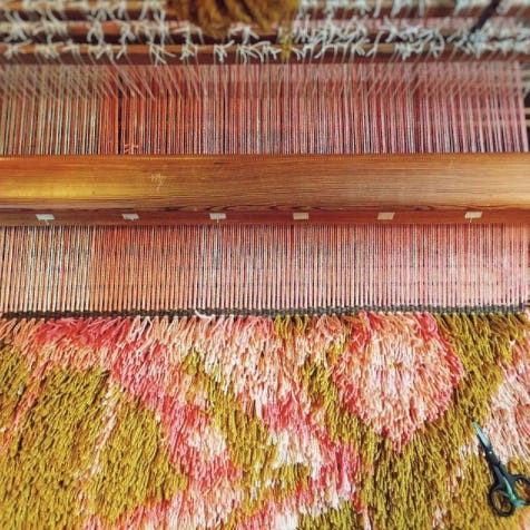 a view of a rya in progress on the loom a view of a rya in progress on the loom