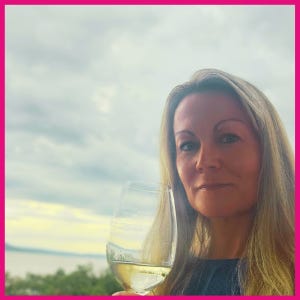 A person holding a glass of wine

AI-generated content may be incorrect.