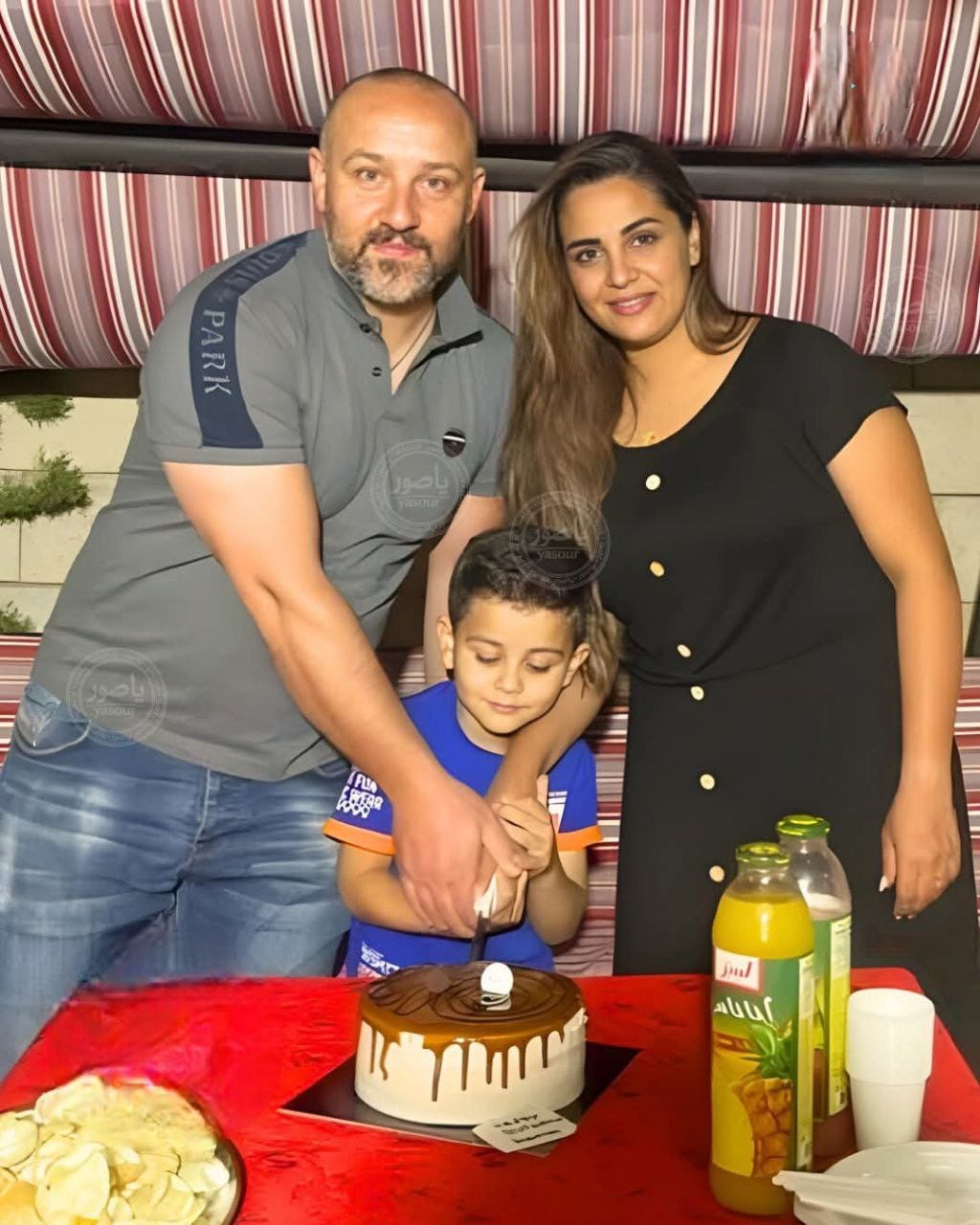 Mahdi Al-Haj Hussein with his wife, Alia, and son Ghadi. All three were killed in a Zionist airstrike.