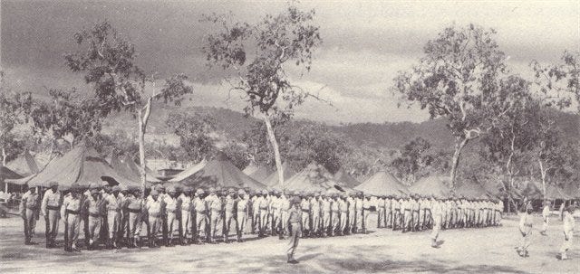 A group of people in uniform standing in a line

AI-generated content may be incorrect.
