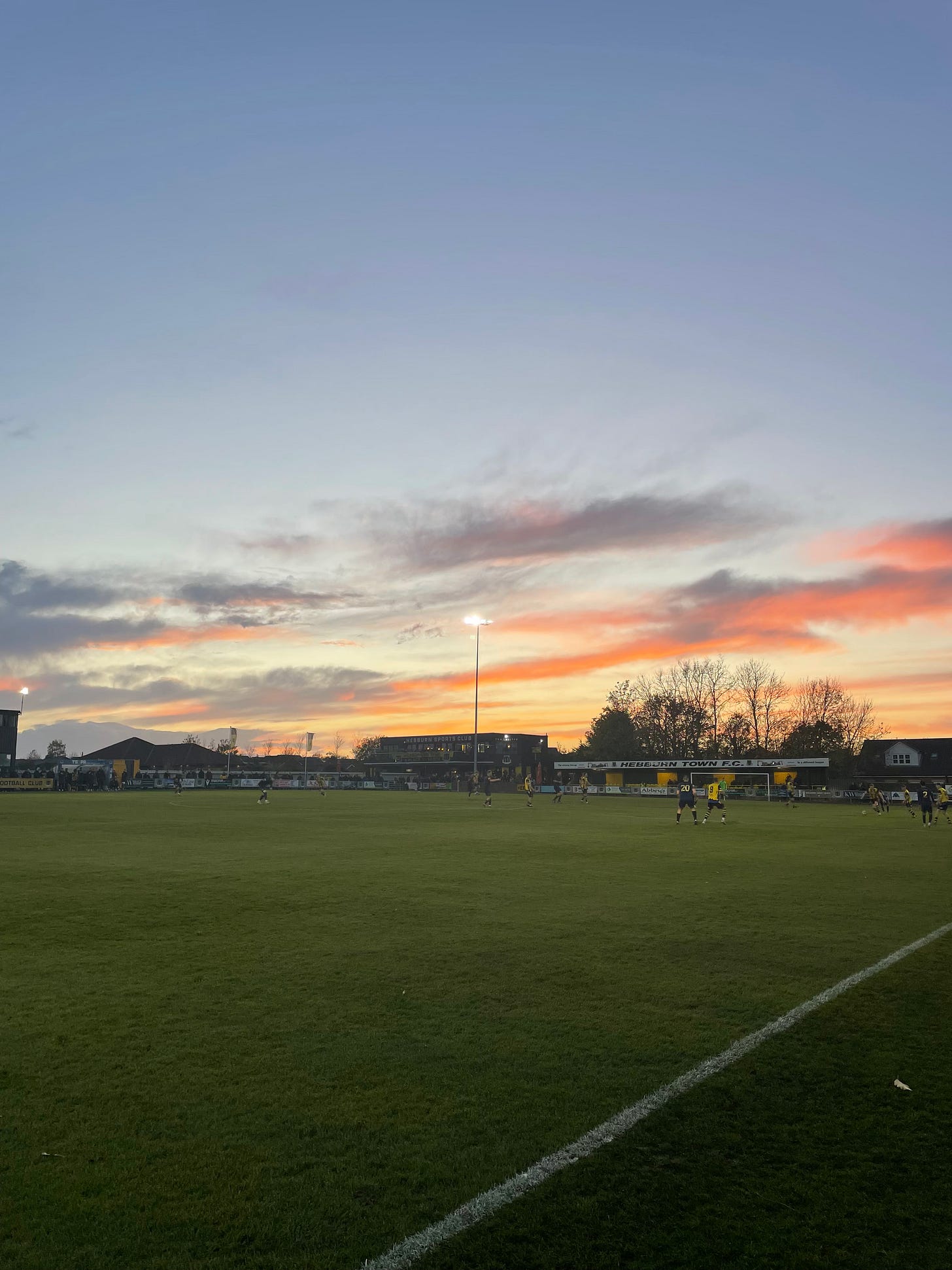 The sun is setting over the pitch at Hebburn