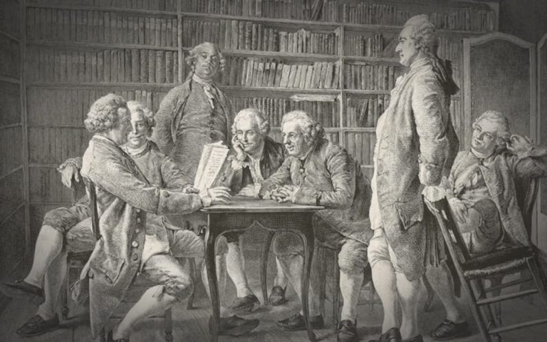 A group of people sitting around a table

Description automatically generated