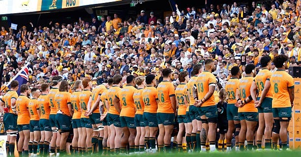 Wallabies stand in a line during the playing of the anthems ahead of The Rugby Championship match between Australia Wallabies and Argentina Pumas at...
