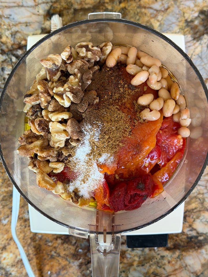 Two pictures of muhammara ingredients in a food processor before and after processing.