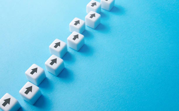 chain of arrows blocks. consistency and focus. concept of conformism, vertical of power. unchanging course of development. moving forward. education and skill growth. building a solid strategy. - replicating bildbanksfoton och bilder