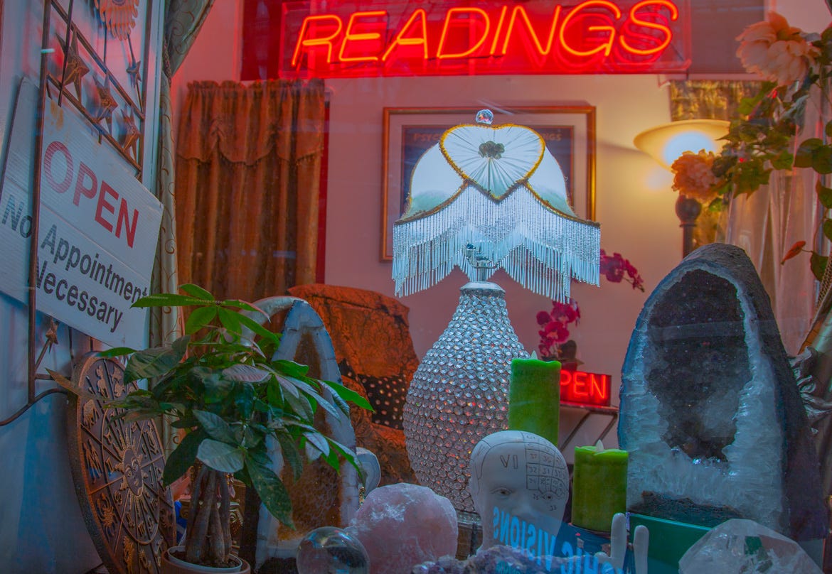 The storefront window of Sarah’s Visions. 