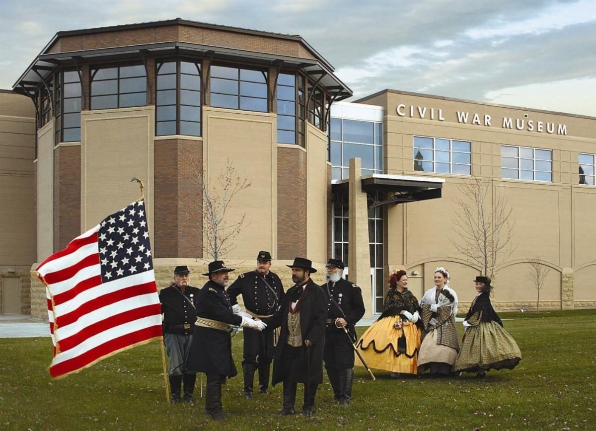 Kenosha, Wisconsin, Civil War Museum with a group of Civil War re-enacters in front.