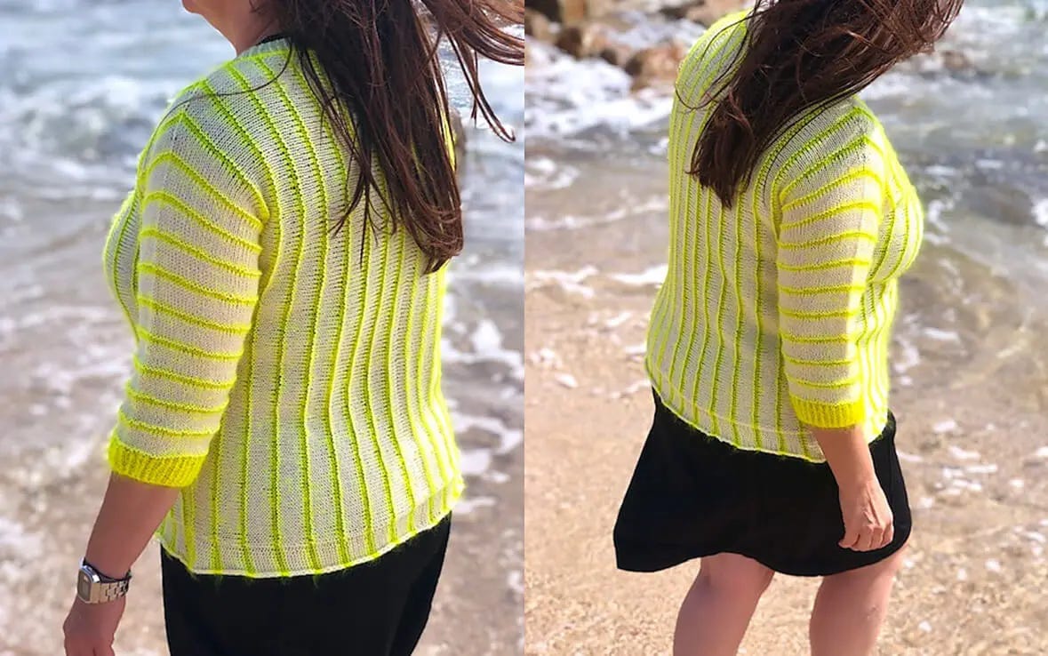 woman on a beach wearing neon yellow and off-white sweater 