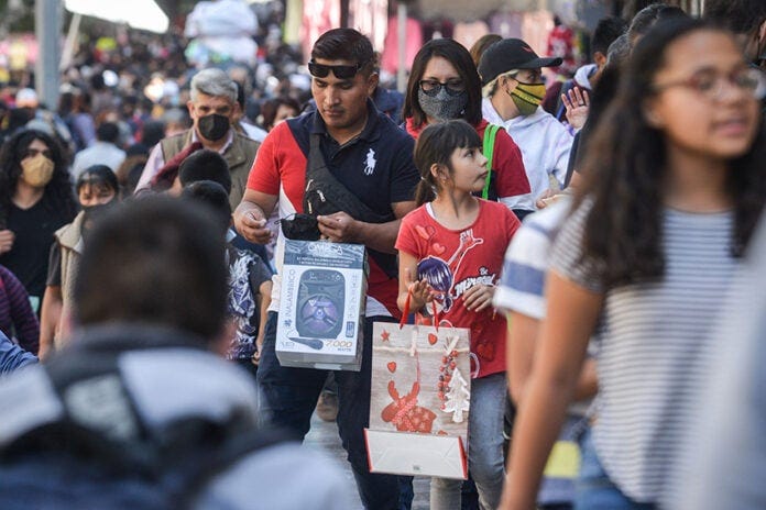 Crowds of families Christmas shopping in downtown Mexico City Crowds of families Christmas shopping in downtown Mexico City