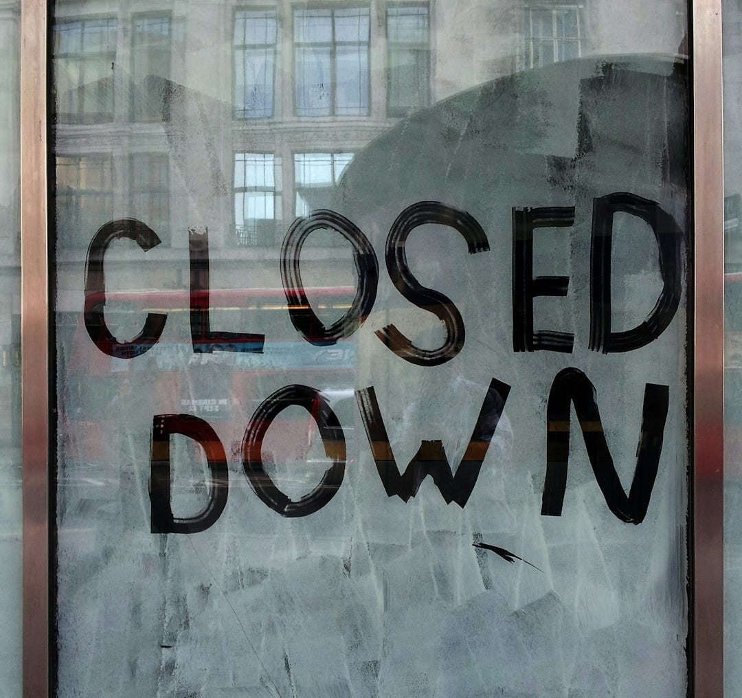 glass window with Closed down print