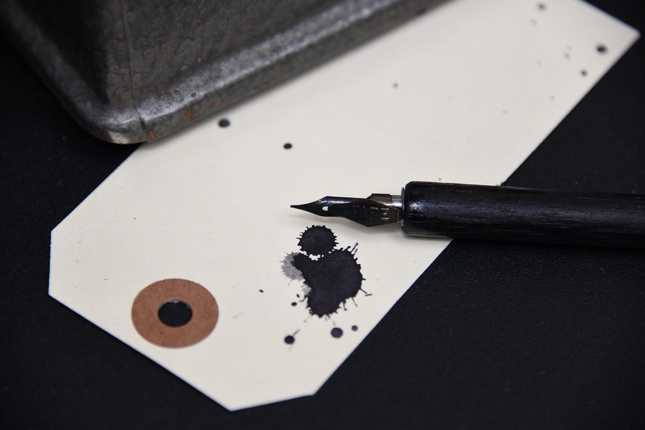 Tag ruined with an ink blot