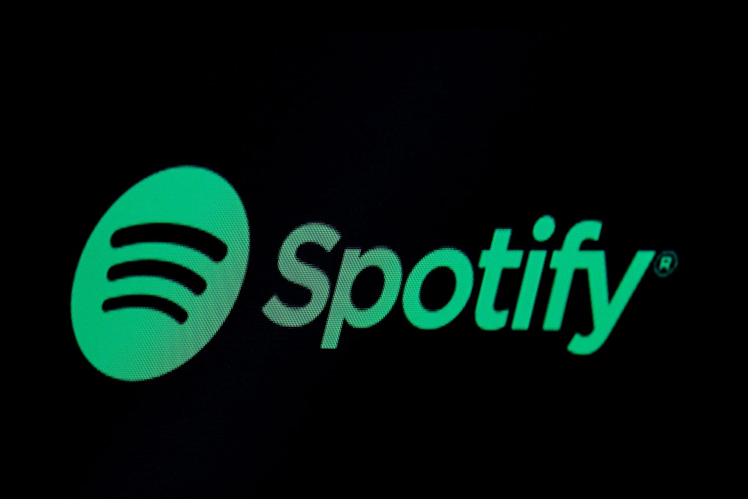 The Spotify logo is displayed on a screen on the floor of the New York Stock Exchange (NYSE) in New York, U.S., May 3, 2018. REUTERS/Brendan McDermid/File Photo