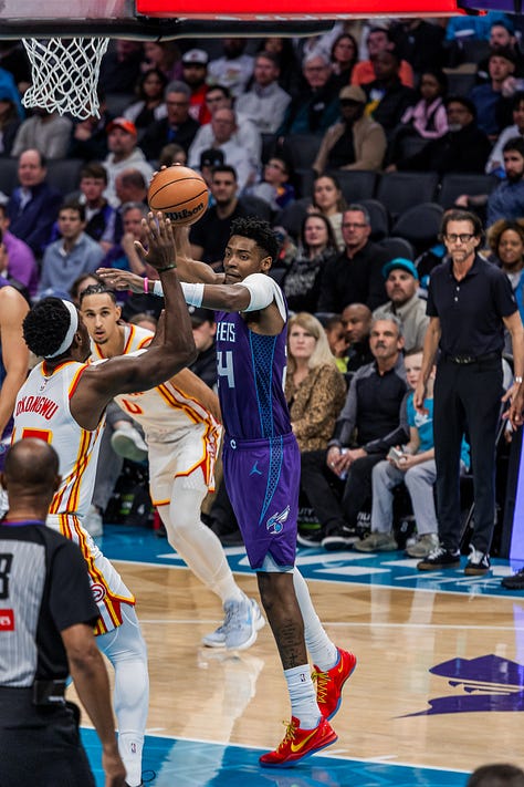 Frame by Frame: Hornets guard Brandon Miller dunks over Atlanta Hawks center Onyeka Okongwu. (Jorge Torres for Y’all Weekly)