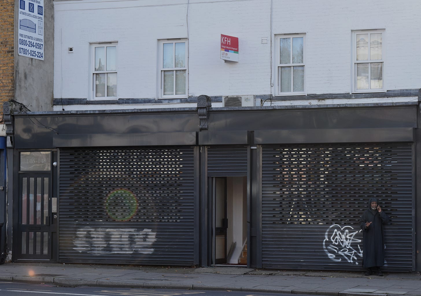 Man on phone in New Cross