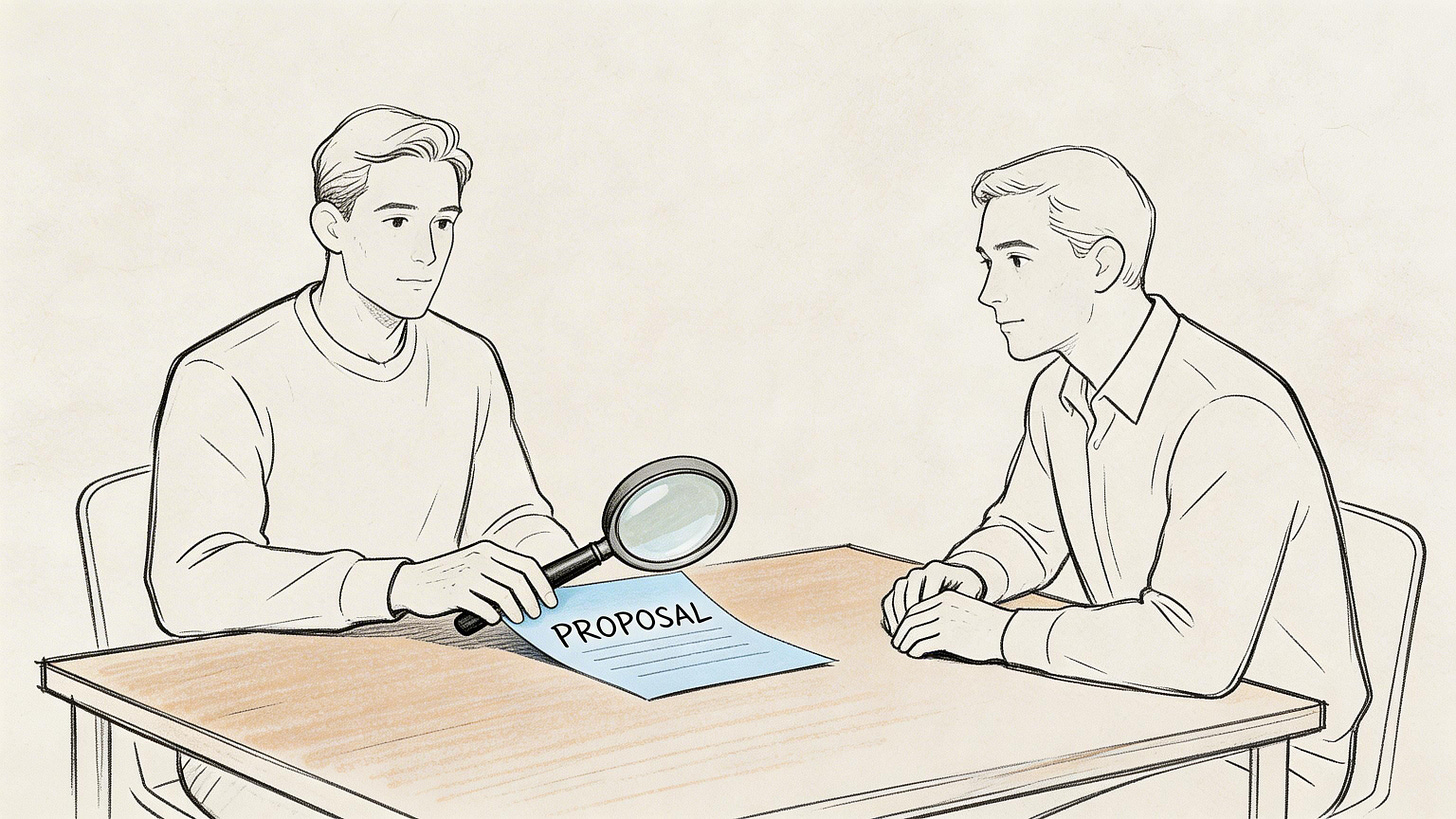 A professional man uses a magnifying glass to review a business proposal document at a desk.