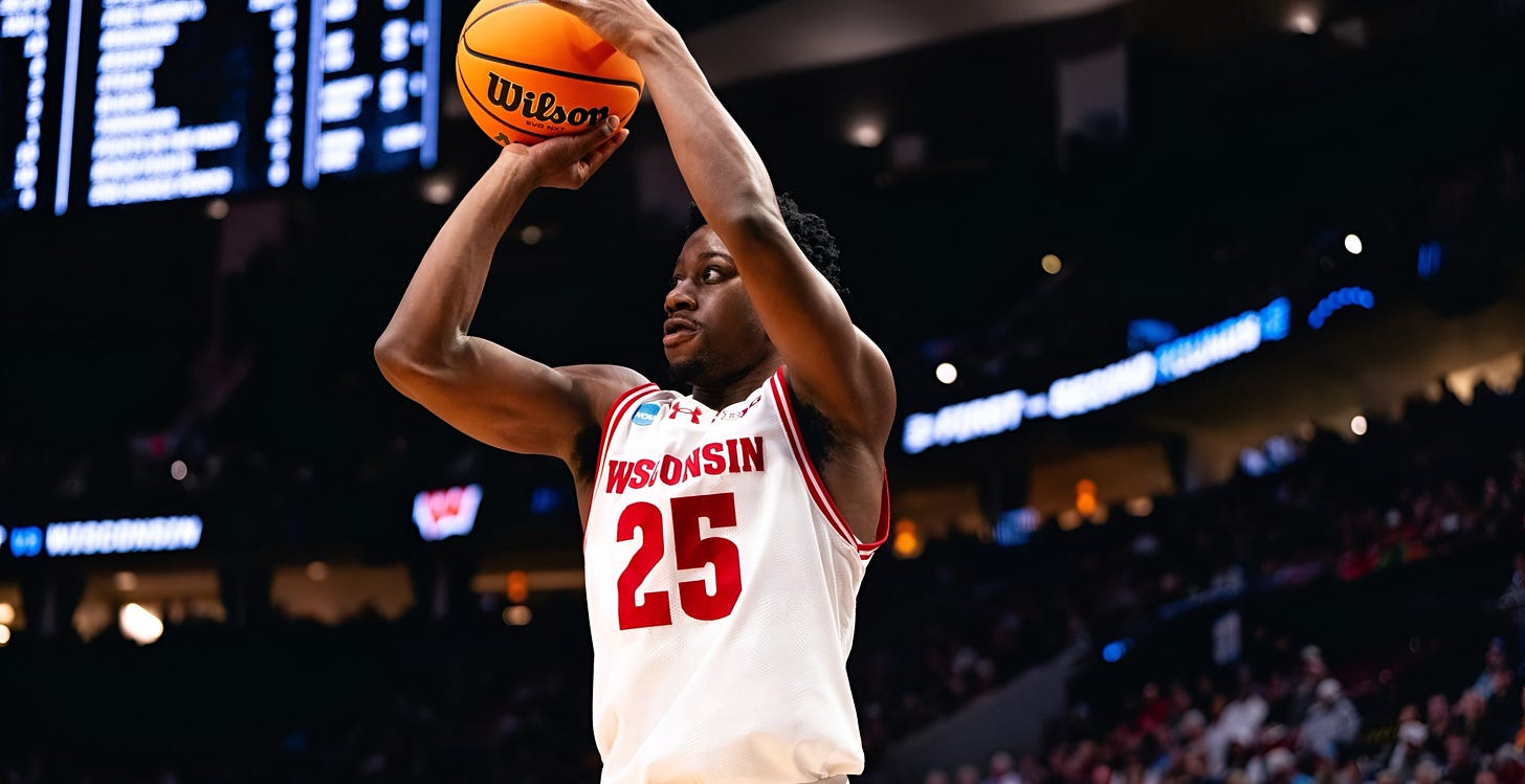 John Blackwell shooting a jump shot for the Wisconsin Badgers in an NCAA Tournament game.