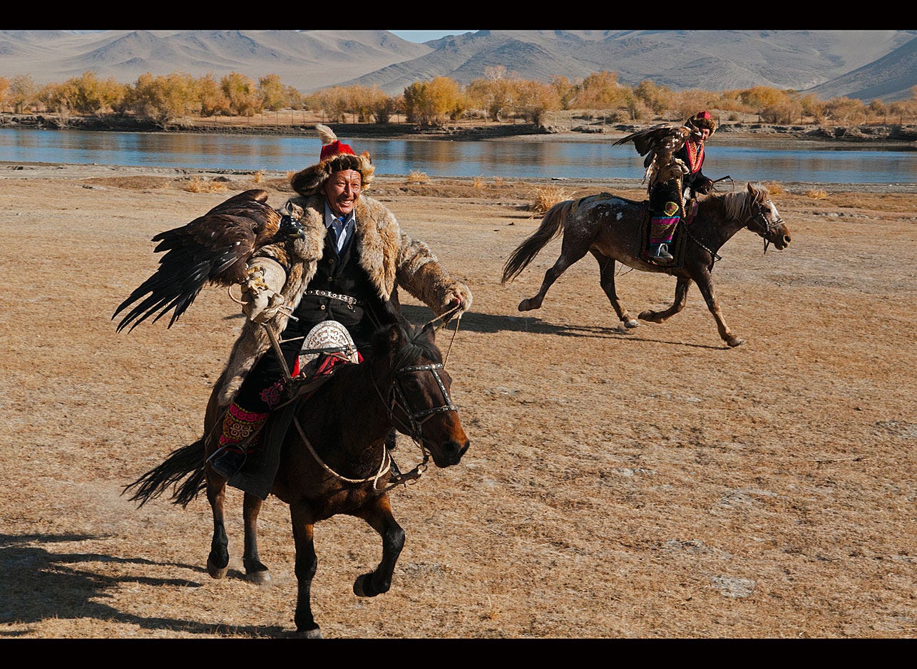 Kazakh eagle hunters and their golden eagles in the Altai Region kazakh eagle hunters