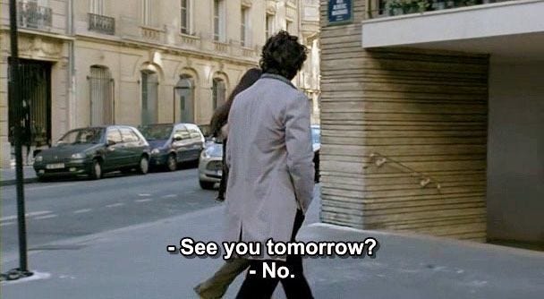 This may contain: a man walking down the street in front of a building with a sign that says see you tomorrow? no