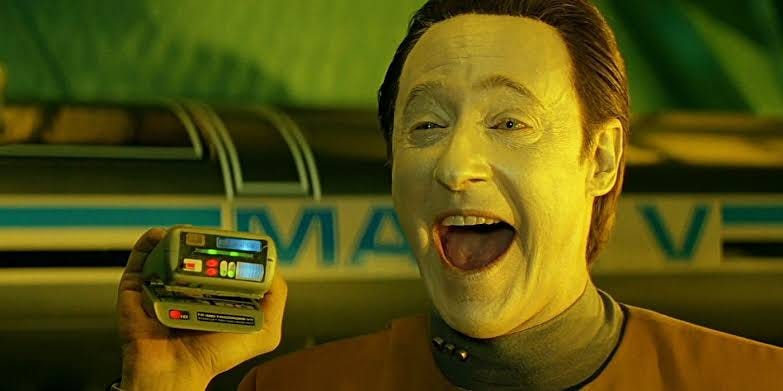 Data experiencing the sudden flood of feelings from his emotion chip, AI generated