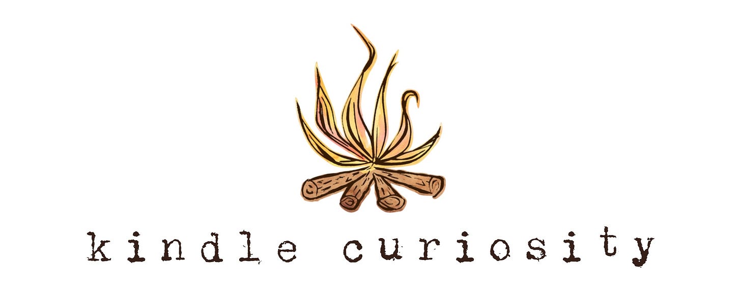 Banner says Kindle Curiosity in a typewriter font. A linocut print of a campfire is above with yellow and orange watercolor detailing.
