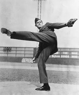 A person in a suit kicking a ball

AI-generated content may be incorrect.