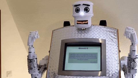 Featured celebrating robot healthcare AI GIF from GIPHY