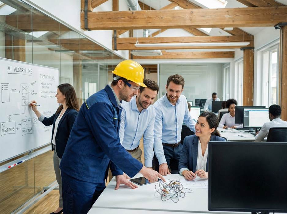 A group of people in an office

AI-generated content may be incorrect.