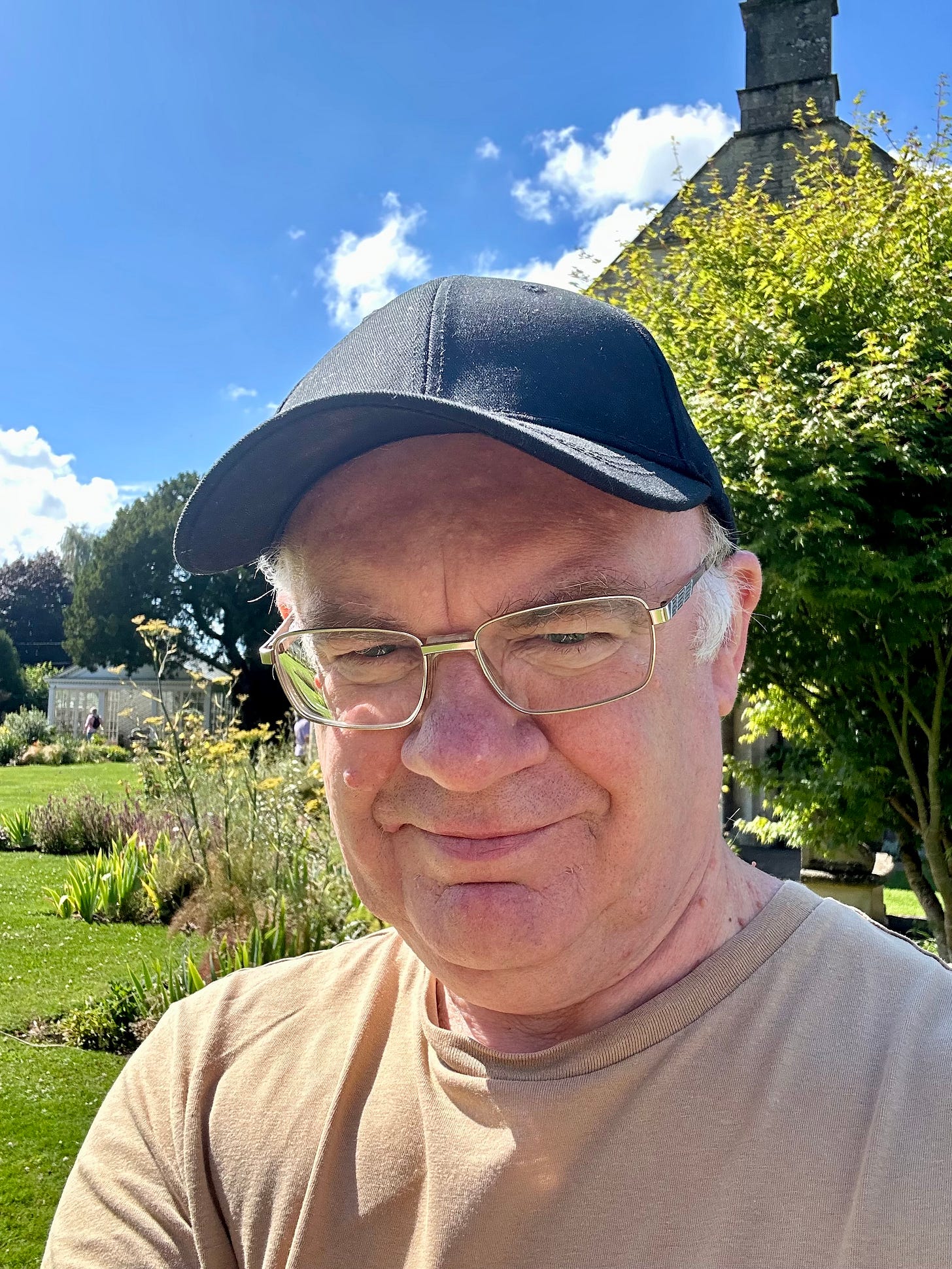 Roland Millward enjoying the sunshine at The Courts, Holt, Wiltshire Roland Millward enjoying the sunshine at The Courts, Holt, Wiltshire