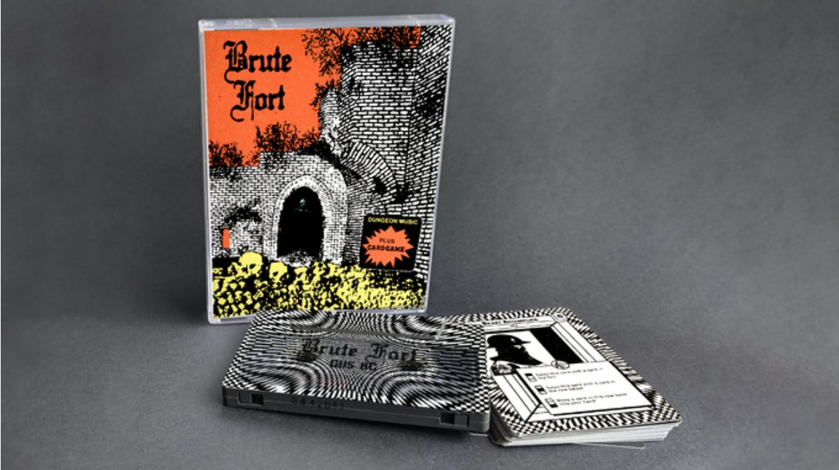 A picture of the Brute Fort card game. It is packaged as a double tape cassette case with a tuck box of cards on one side and a tape cassette soundtrack on the other side. The artwork depicts a ruined catle against a red sky with yellow skulls piled in front.