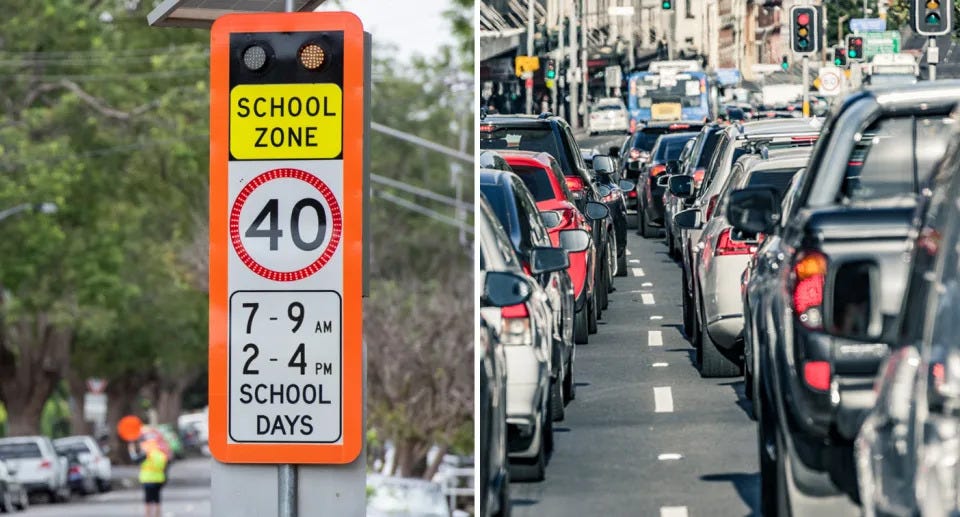 Speed camera inside school zone sign and traffic.