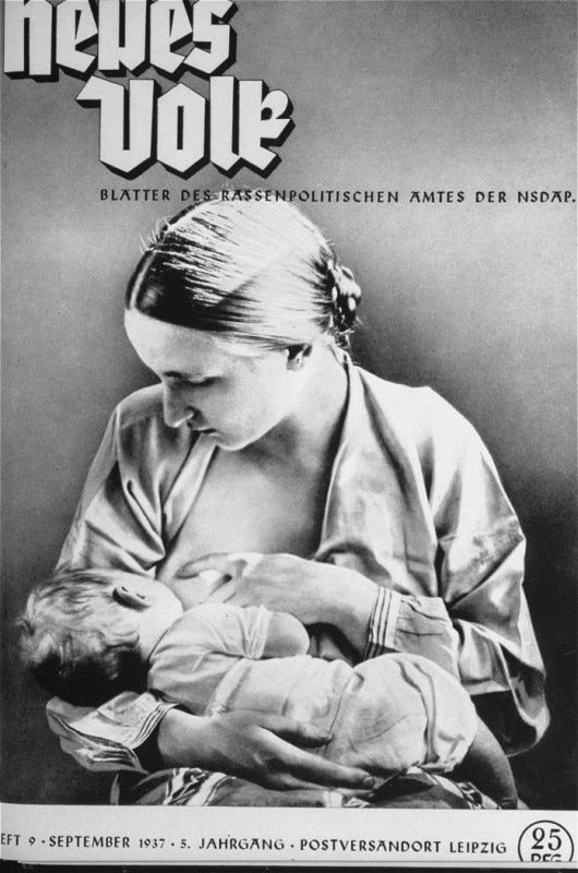 A mother with light skin tone breastfeeds her child. Her hair is pinned up and her shirt is open. One hand holds the child, the other positions her breast for feeding. A mother with light skin tone breastfeeds her child. Her hair is pinned up and her shirt is open. One hand holds the child, the other positions her breast for feeding.