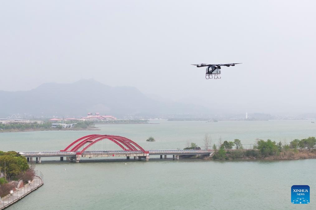 "XPENG AEROHT flying car air module during a flight demo at Liuye Lake, Changde, Hunan, March 27, 2025."