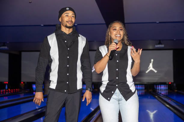 Mookie Betts and Brianna Betts speak during the Mookie Betts 5050 Foundation charity bowling event at Lucky Strike LA Live on February 03, 2024 in...