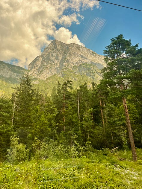 scenic photos of scenery through the train in Slovenia and Austria
