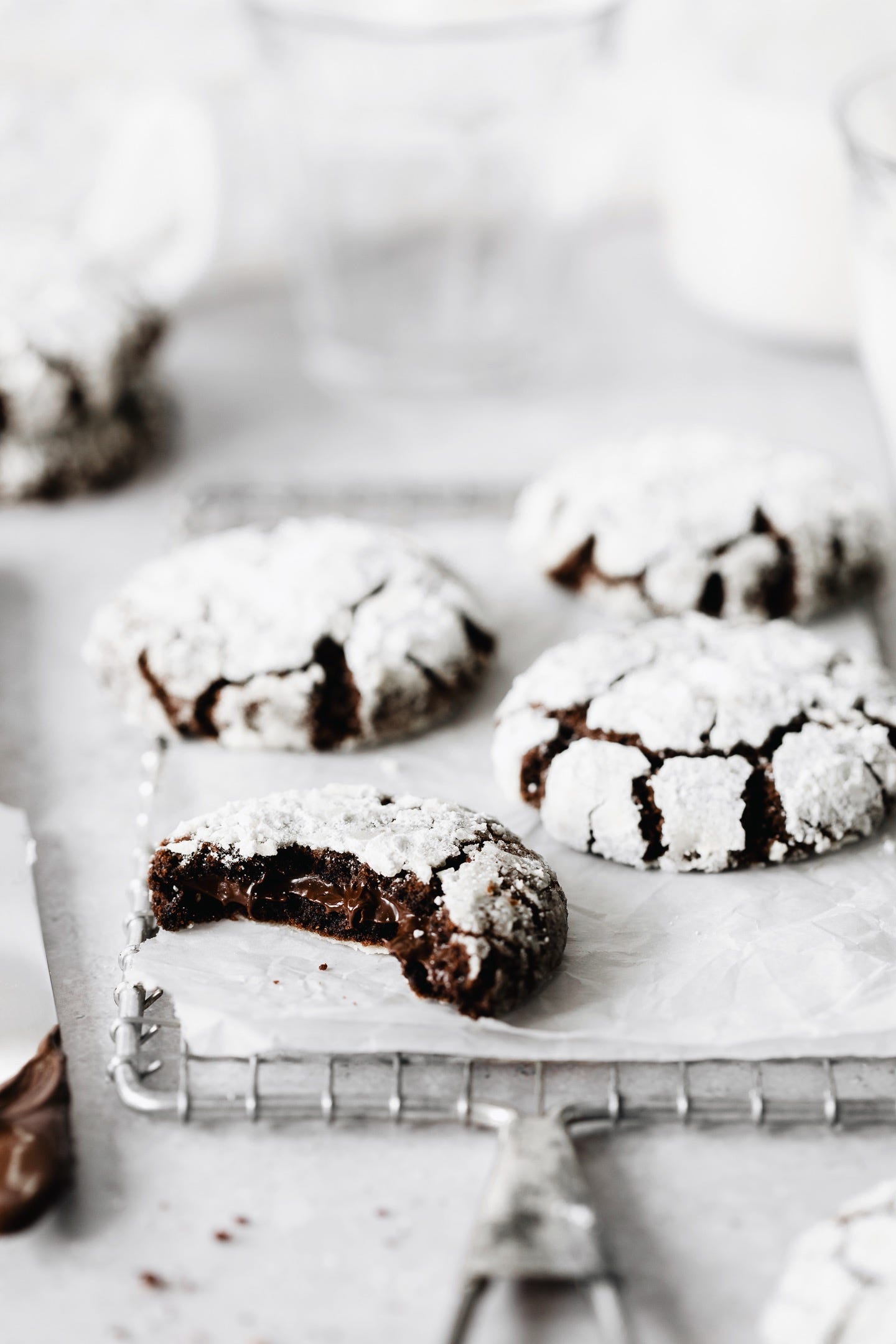 Vegan chocolate hazelnut stuffed snowballs on cookie rack Vegan chocolate hazelnut stuffed snowballs on cookie rack