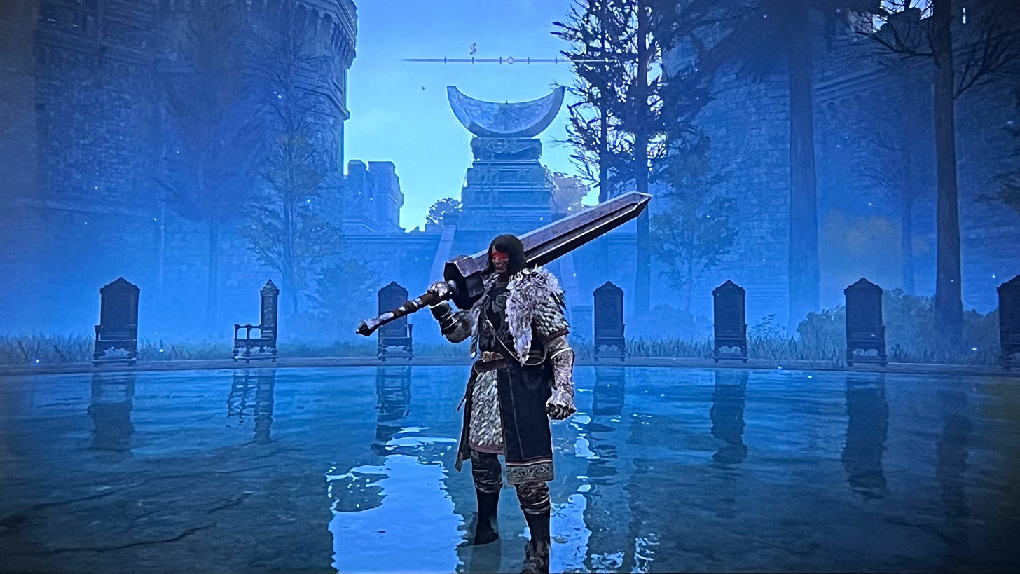 Warrior in a misty pool holding a large sword