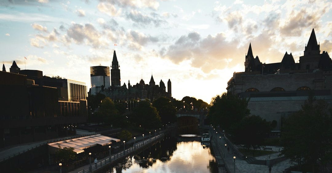 body of water near buildings during daytime