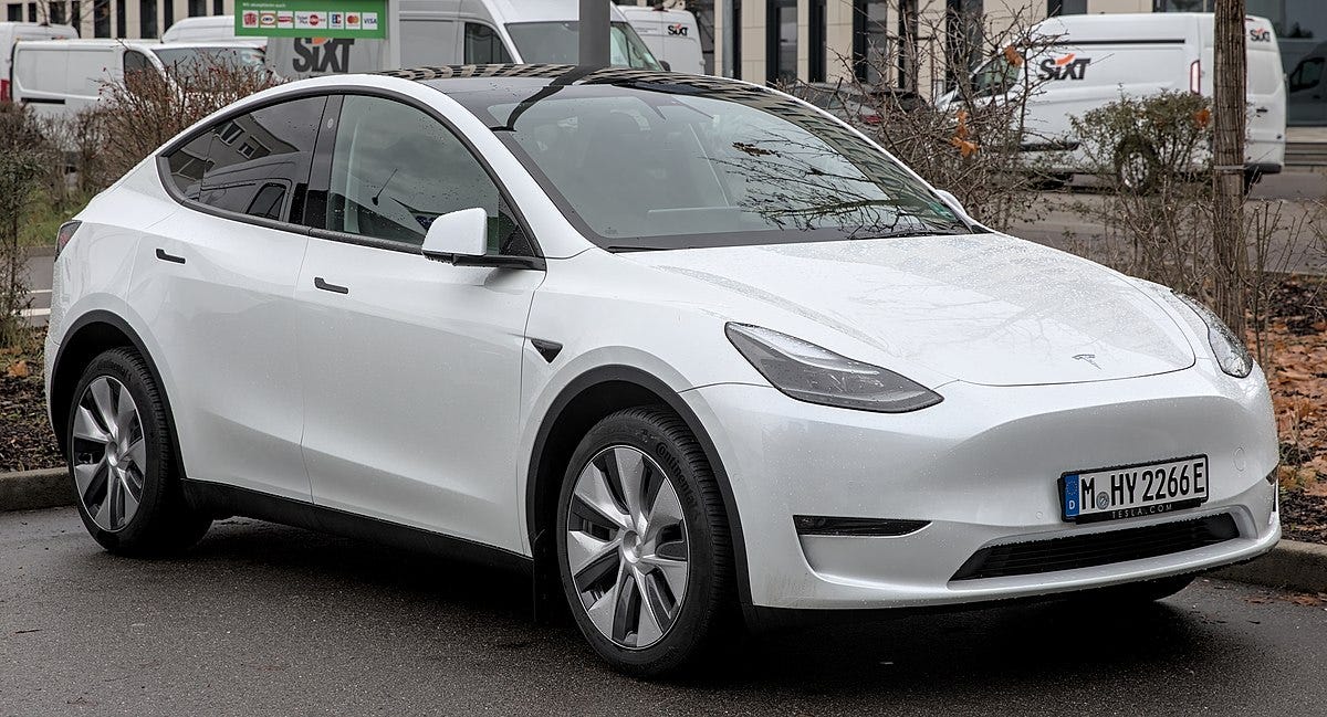 https://upload.wikimedia.org/wikipedia/commons/thumb/5/5c/Tesla_Model_Y_1X7A6211.jpg/1200px-Tesla_Model_Y_1X7A6211.jpg