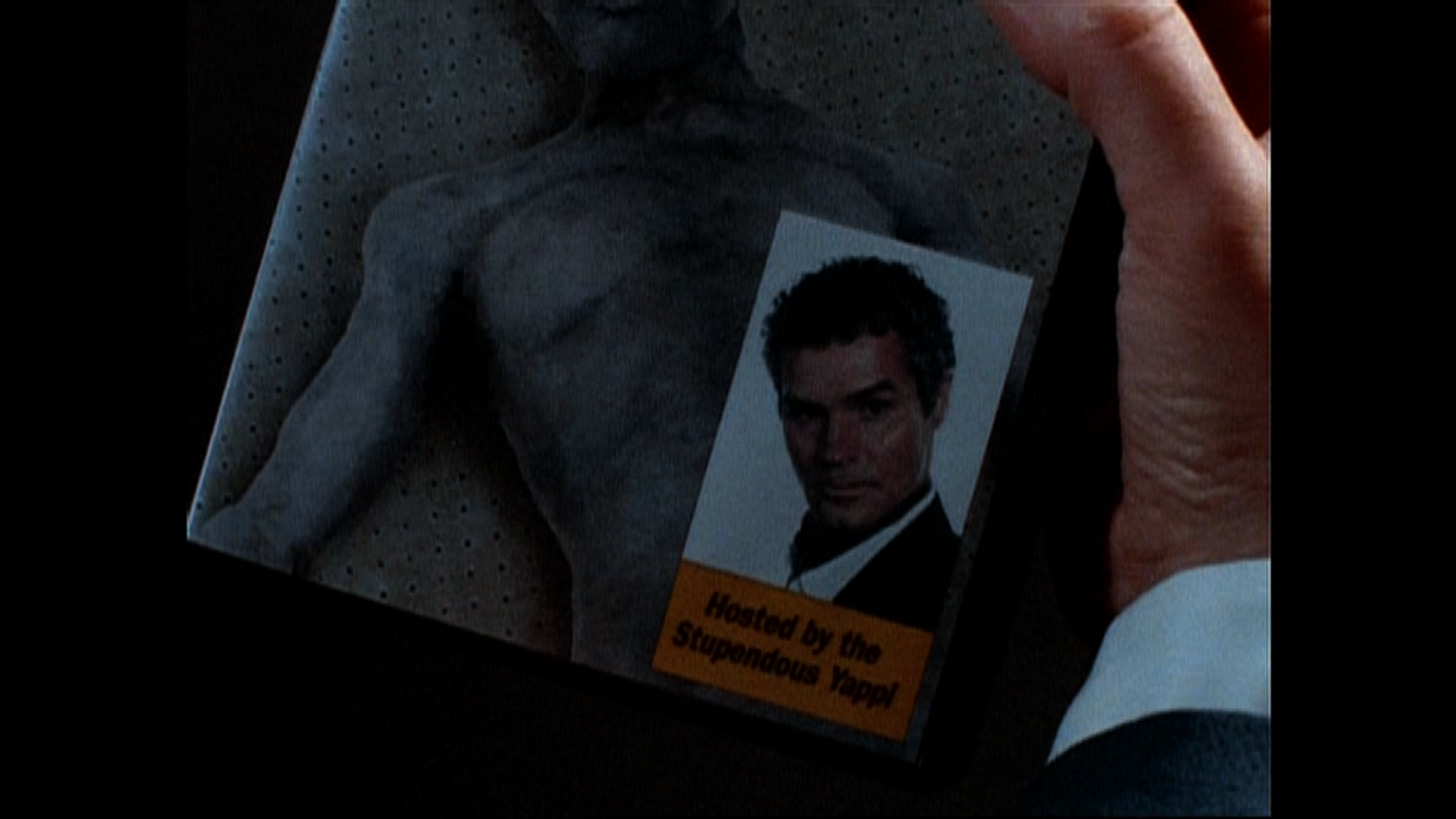 Image of a videotape with a dead alien body on the cover. It is noted the videotape is narrated by the Stupendous Yappi. Image of a videotape with a dead alien body on the cover. It is noted the videotape is narrated by the Stupendous Yappi.