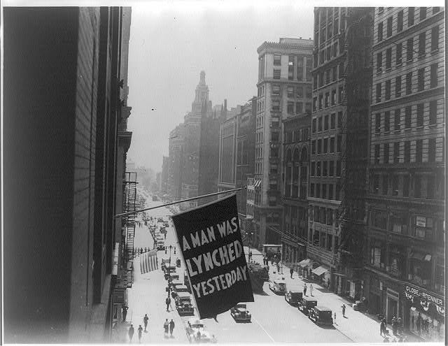 [Flag, announcing lynching, flown from the window of the NAACP headquarters on 69 Fifth Ave., New York City]
