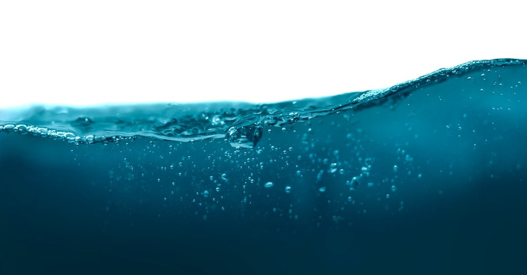 water drops on blue surface