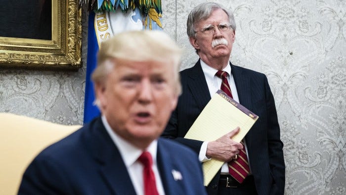 WASHINGTON, DC - JULY 18 : National Security Advisor John R. Bolton listens as President Donald J. Trump meets with Prime Minister of the Netherlands Mark Rutte in the Oval Office at the White House on Thursday, July 18th, 2019 in Washington, DC. (Photo by Jabin Botsford/The Washington Post via Getty Images)